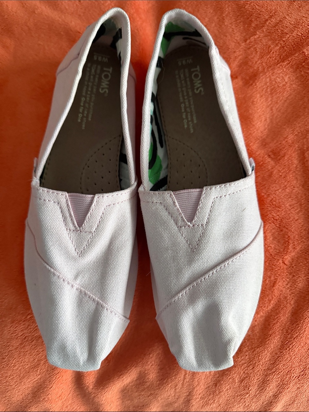 Toms slip-on canvas flats in pale pink